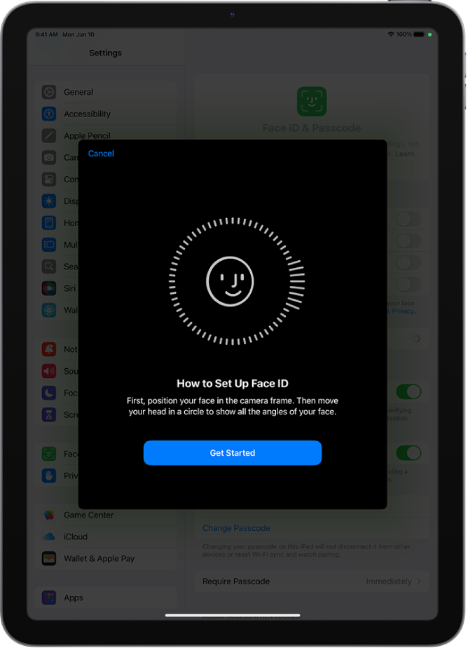 The Face ID recognition setup screen. A smiley face is showing on the screen, enclosed in a circle. Text below instructs the user to move their head slowly to complete the circle. A button for Get Started appears near the bottom of the screen.